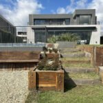 exterior-vivienda-ampliada-contrafrente-puertos-despues
